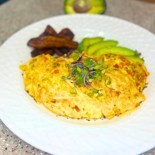 Plantain And Chorizo Omelet with fried sweet plantains and avocado by Chef Winston