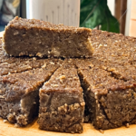 Authentic Virgin Islands Sweet Potato Pudding with rum glaze, coconut, pumpkin, and warm Caribbean spices by Chef Winston