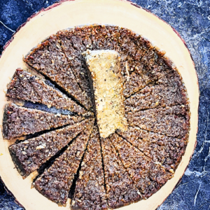 Authentic Virgin Islands Sweet Potato Pudding with rum glaze, coconut, pumpkin, and warm Caribbean spices by Chef Winston