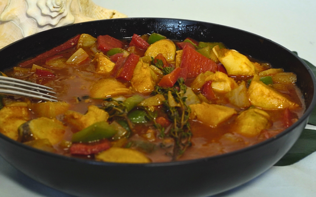 Conch Creole by Chef Winston featuring tender conch in a rich Caribbean Creole sauce with peppers, herbs, and island spices
