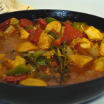Conch Creole by Chef Winston featuring tender conch in a rich Caribbean Creole sauce with peppers, herbs, and island spices