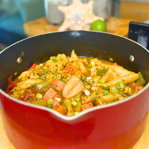 Caribbean Stewed Conch Recipe by Chef Winston served with homemade coconut dumplings in a rich island-style gravy.